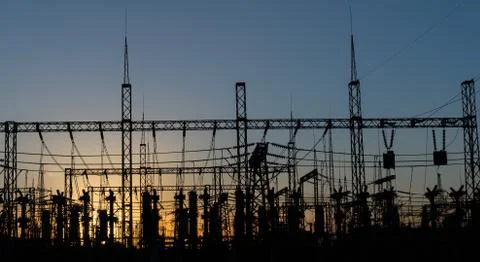 Electrical substation silhouette on the dramatic sunset background. 写真素材