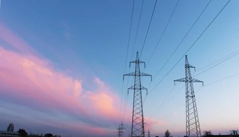 Electrical substation silhouette on the dramatic sunset background Fotos de archivo