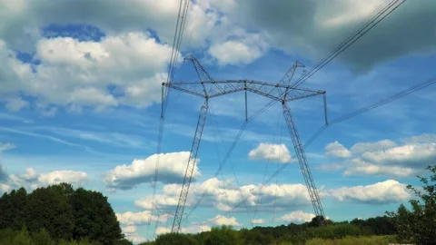 Electrical support on the sky background Stock Footage 137700473