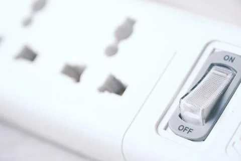 Electrical switch and plug on color background, Stock Photos