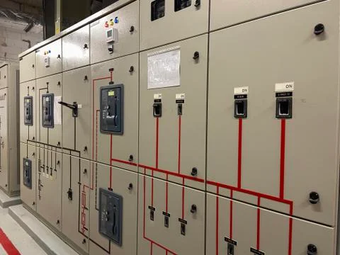 Electrical switch control cabinet, electrical switchboard in industrial plant Stock Photos