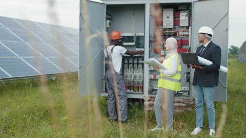 Electrical Systems Equipment Power Distribution Cabinet. Multiracial people Stock Footage 168914417