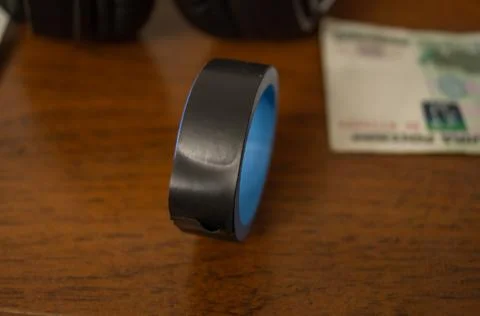Electrical tape lying on the table next to a banknote Fotos de archivo