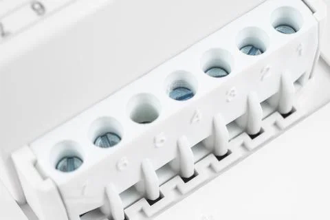 Electrical terminal block background. Macro shot connector or clamps for ca.. Foto stock