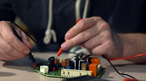 Electrical is testing with voltmeter for repair electronic equipment Video stock 68848646
