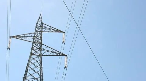 Electrical tower on blue sky (pan) Stock Footage 11625438