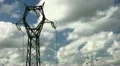 Electrical tower on cloudy sky HD Footage