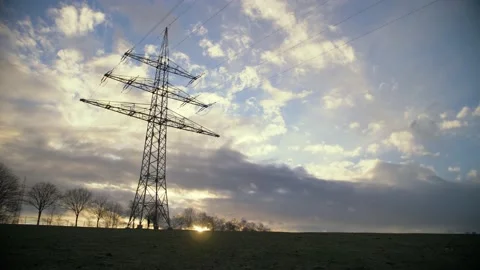 An electrical tower in Germany during a spectacular sunset with dramatic sky. Stock Footage 145322047