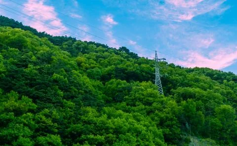 Electrical tower on side of mountain Stock Photos