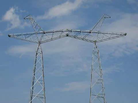 Electrical tower without wires against the blue sky Foto stock