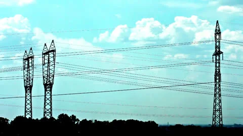 Electrical towers and cloudy sky 库存影片 24811160