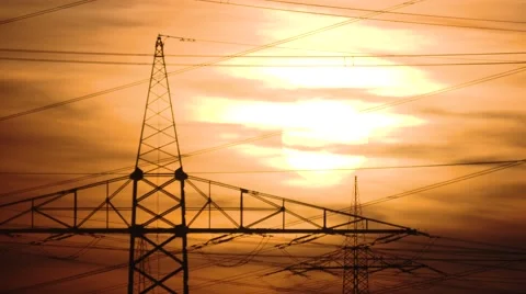 Electrical towers with a sunset Stock Footage 62853525