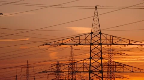 Electrical towers with a sunset in germany Stock Footage 63317143