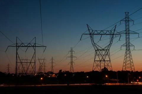 Electrical Towers at Sunset Stock Photos