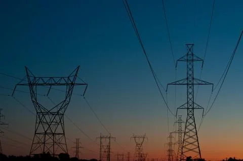 Electrical Towers at Sunset Stock Photos