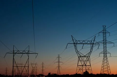 Electrical Towers at Sunset Stock Photos