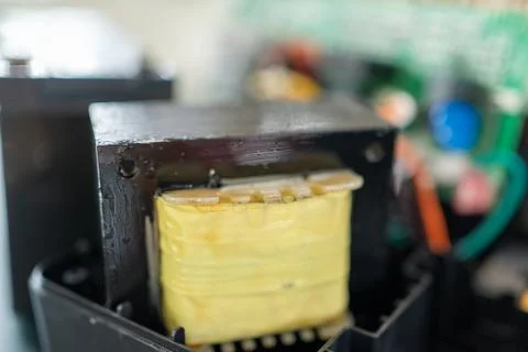 Electrical transformer in UPS, power backup battery for personal computers. Stock Photos