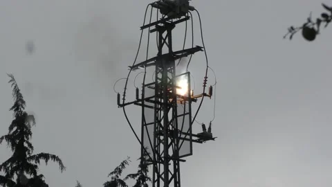 Electrical utility high voltage line transformer explodes and burns Stock-Footage 167235553