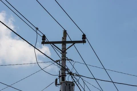 Electrical Utility Pole with Distribution Transformer and Complex Overhead .. Stock Photos