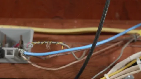 Electrical Wires on Basement Ceiling CLOSE UP SLIDE RIGHT Stock-Footage 104874943