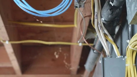 Electrical Wires on Basement Ceiling TILT UP Stock-Footage 104875165