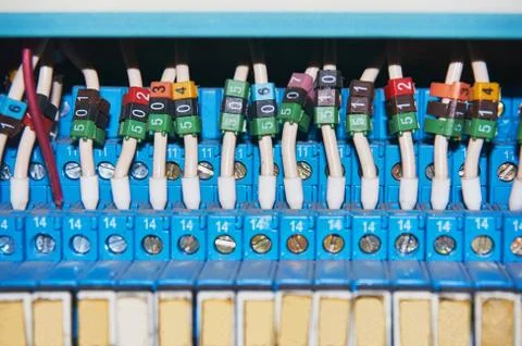 Electrical wires connected to the numbered relays. Stock Photos
