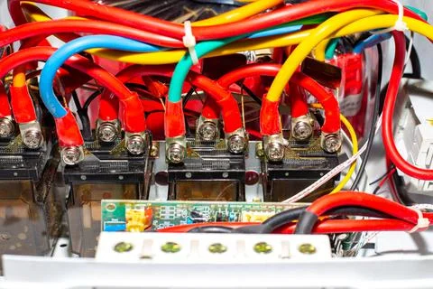 Electrical wires in an energy stabilization device. Voltage stabilizer repair 스톡 사진