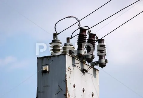 Electrical Wires Extending From The Transformer Station Near The Railway