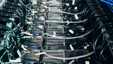 Electrical wires plugged into functioning servers. Network and data servers Stock Footage 111286968