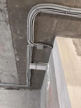 The electrical wires in the protective corrugated cable tube and the juncti.. Foto stock