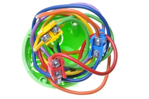 Electrical wires in wall socket Foto stock