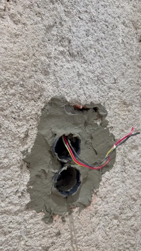Electrical wires wall.Wall socket hole Stock Footage 340427477