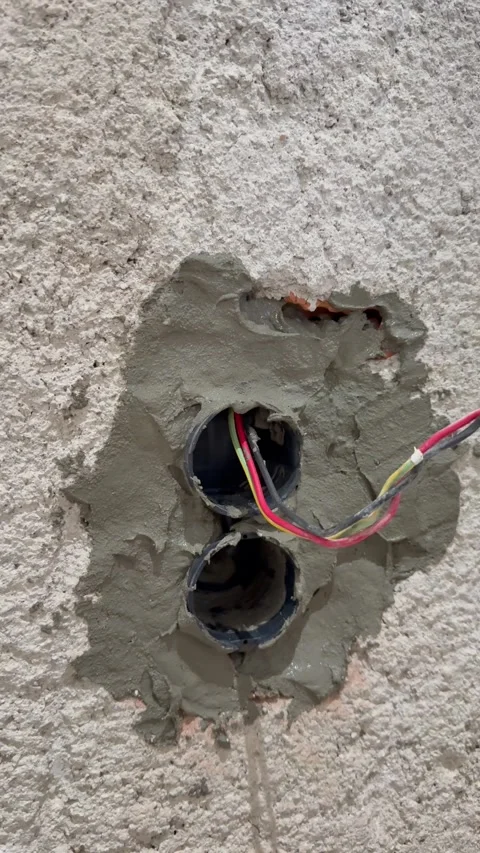 Electrical wires wall.Wall socket hole Stock Footage 340427488