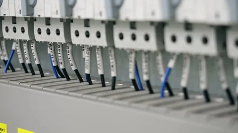 Electrical Wiring and Components Inside Industrial Control Cabinet Vídeos de archivo 345013114