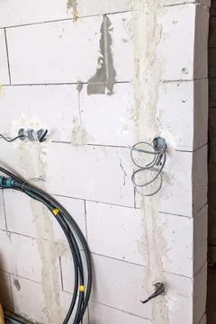 Electrical wiring concept background. The electrical box with wires is mounted Photos