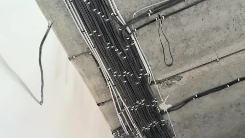 Electrical wiring installation on ceiling during house renovation, Stock Footage 330538726