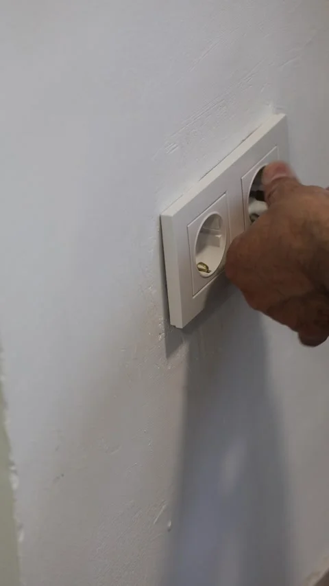Electrical wiring installation. Electrical wires wall.Wall socket hole Stock Footage 340427252