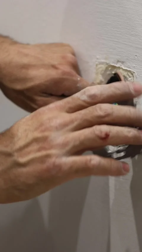Electrical wiring installation. Electrical wires wall.Wall socket hole Stock Footage 340427555