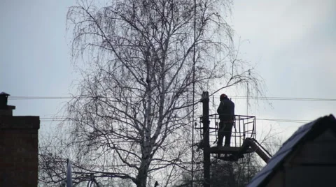 Electrical wiring repairs on a pole Stock Footage 51611808