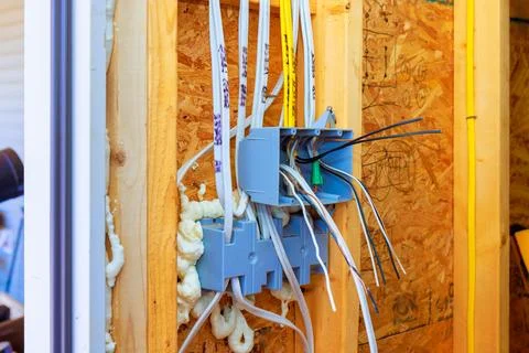 Electrical wiring setup with junction box wires during home renovation in Stock Photos