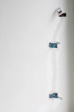 Electrical Wiring under plaster, hidden installation cables for socket to a c Fotos de archivo