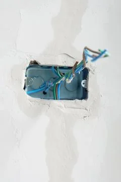 Electrical Wiring under plaster, hidden installation cables for socket to a c Stock Photos