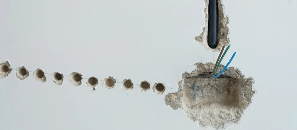 Electrical Wiring under plaster, hidden installation cables for socket to a.. Stock Photos