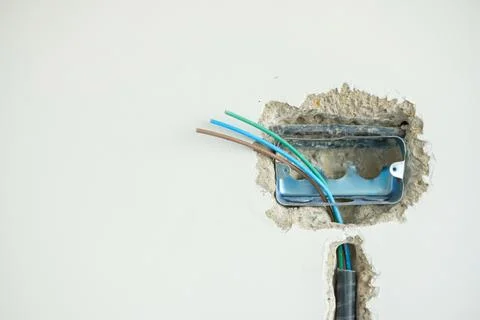 Electrical Wiring under plaster, hidden installation cables for socket to a.. Stock Photos