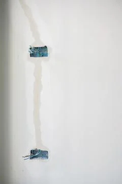 Electrical Wiring under plaster, hidden installation cables for socket to a.. Stock Photos