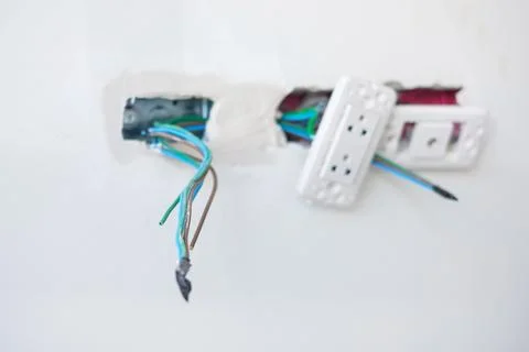 Electrical Wiring under plaster, hidden installation cables for socket to a.. Stock Photos
