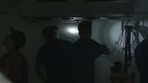 Electrical work in the dark Stock Footage 33444480