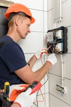 Electrical work indoors. Stock Photos