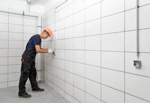 Electrical work indoors. Stock Photos