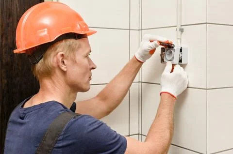 Electrical work indoors. Stock Photos